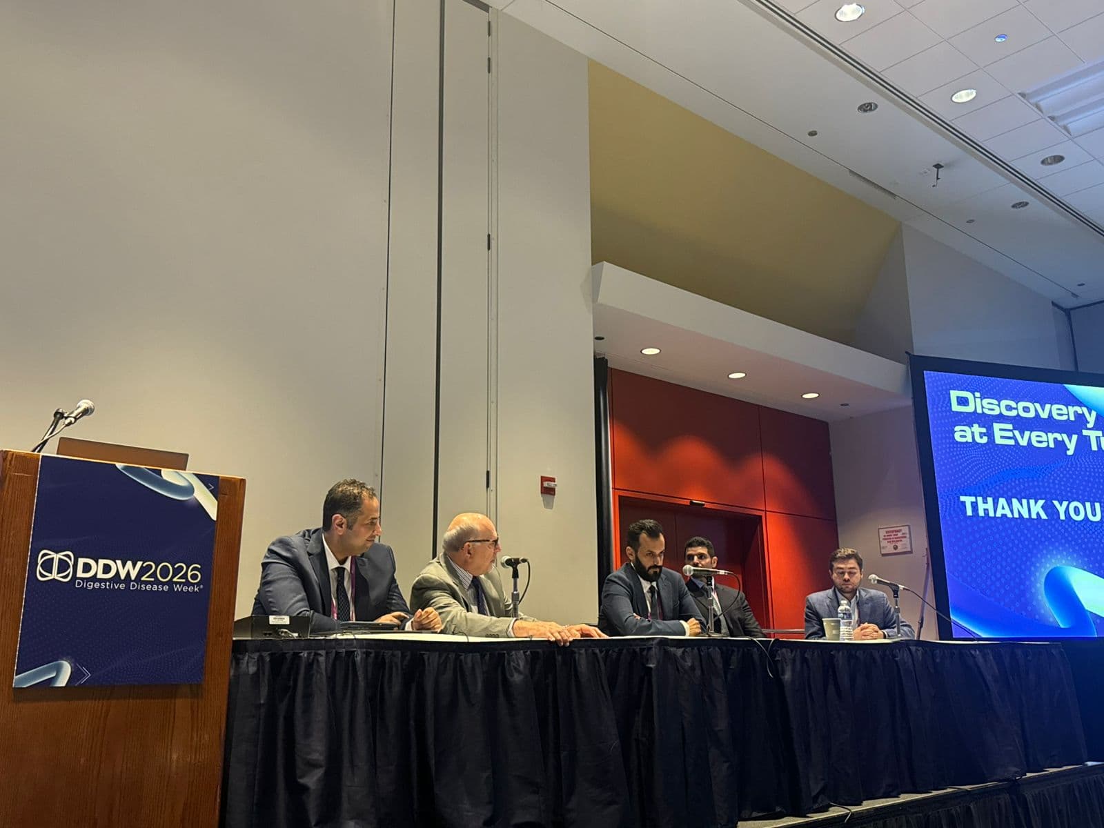 SGA and ASGE faculty seated together on the panel during the W187 BC clinical session at DDW 2026.