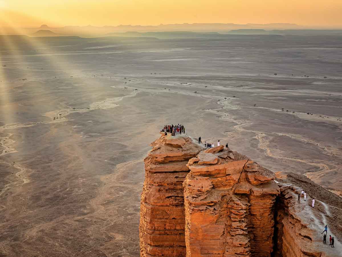 The Edge of the World (Jebel Fihrayn) — a sheer 300-metre cliff on the Tuwaiq escarpment.